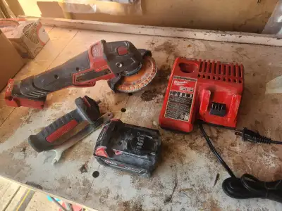 MILWAUKEE 5" cordless grinder c/w battery & Charger For Sale,, View more