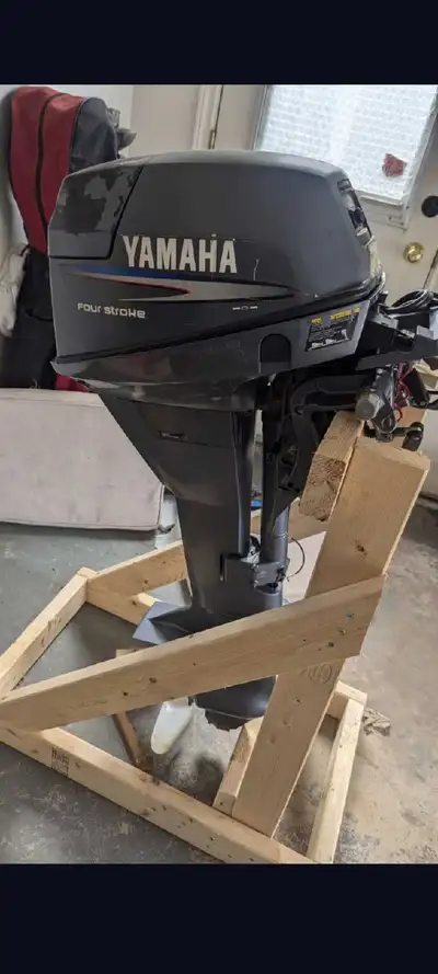 Yamaha outboard, 2003 (?). Have owners manual. Electric start always worked. Great parts motor. It c...