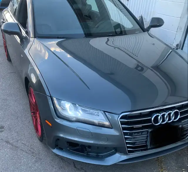 2012 AUDI A7 3.0596423598156687365