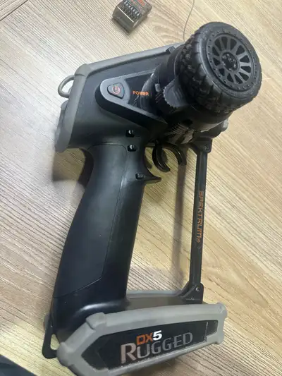 I'm selling my used Spektrum DX5 Rugged transmitter with an SR6200A receiver. The receiver wire has...