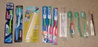 11 NEW Toothbrushes All In Original Packaging