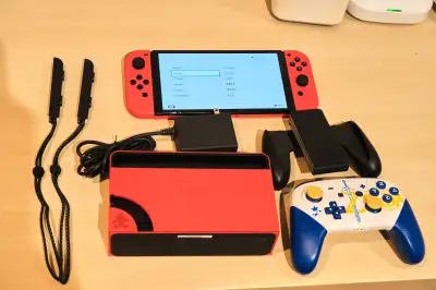 Nintendo Switch Oled (extra controller, 512gb sd card), View more