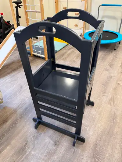 Used Learning Tower or Kitchen Helper, Blue. Folds for compact storage and height can be adjusted to...