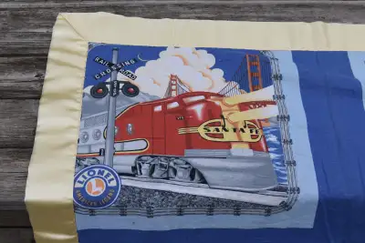 Lionel Train Blanket. Size: 36" X 38". I can ship this VIA Canada Post with tracking. Send postal co...