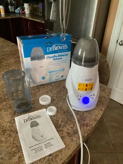 It is brand new and comes with box and instructions Dr. Browns Deluxe Bottle Warmer & Sterilizer qui...