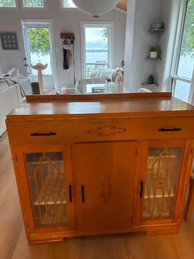 Solid wood buffet with glass doors., View more
