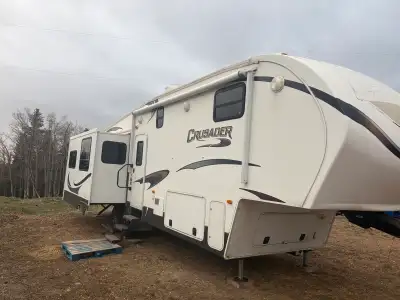 I'm selling a used 2013 Crusader fifth wheel, a spacious and comfortable RV perfect for long road tr...