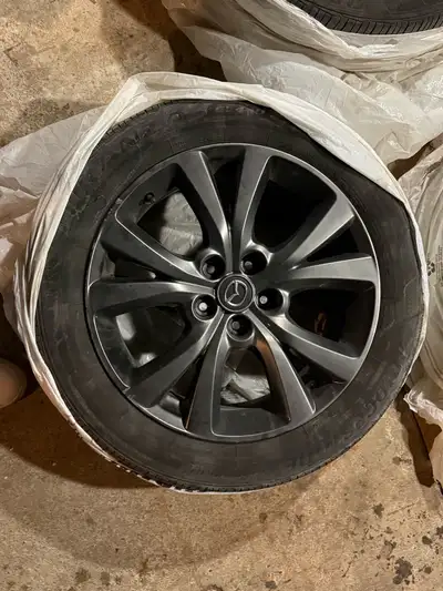 Full set of 4 Mazda factory rims with Bridgestone Turanza all-season tires (215/55R17). Great tread...