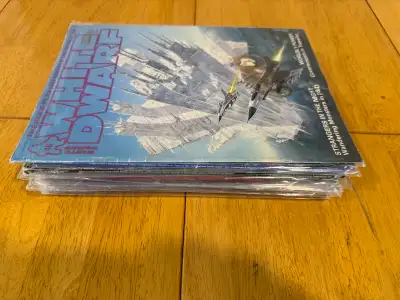 Dive into the lore and strategies of Warhammer with this lot of White Dwarf magazines! These vintage...