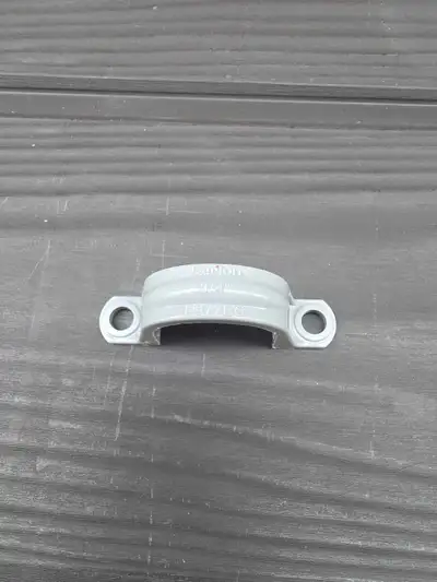 3/4 a shopping bag of PVC clamp about 100 pcs