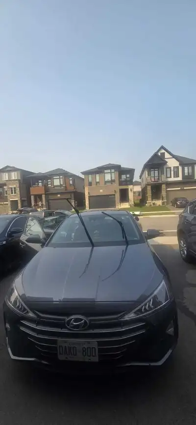 This is a Hyundai Elantra, low on kilometers, equipped with winter tires on rims and a new battery,...