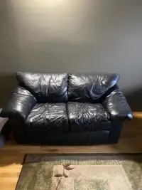 Leather couch, love seat,and ottoman