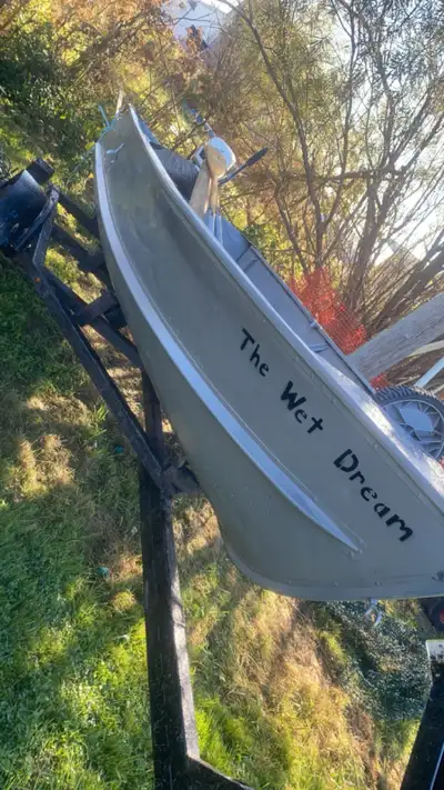 12 foot aluminum boat, wide and deep, stable in the water, has a few patches but works good, boat on...