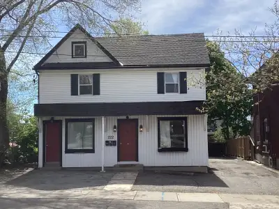 The door to the left in the main picture leads to a cozy second floor one bedroom apartment on the e...