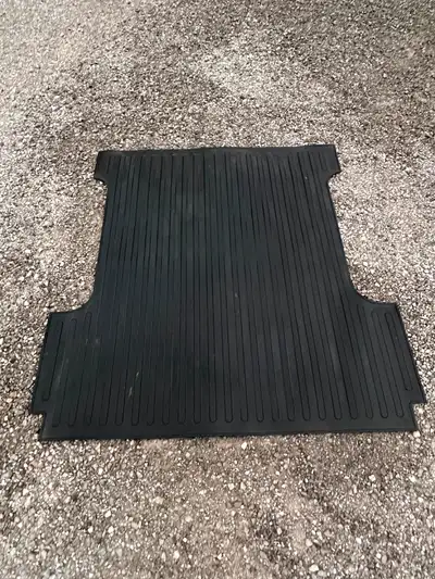 Rubber fitted mat for F150 5-1/2 ft box. No rips, great condition. $100