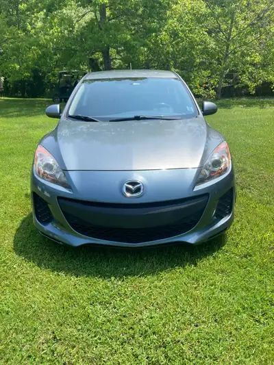 2012 Mazda 3 Hatchback 2.0lt engine 5 speed manual transmission. This is the base model so no AC or...