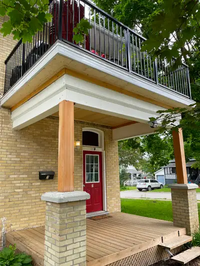 Beautiful detached duplex offering the upper floor, private front entrance, newly renovated deck off...