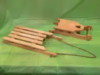 Two decorative wood sleds