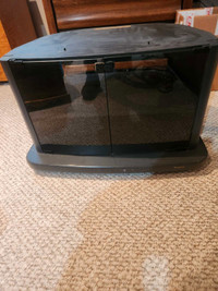 Custom T.V Stand with center shelf and glass doors