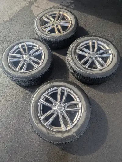 **5‑bolt 17‑inch wheel from a 2017 Infiniti QX50** **Michelin X-Ice Winter tires with about 50% life...