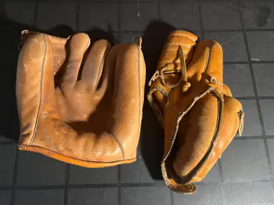 Two vintage baseball gloves, View more