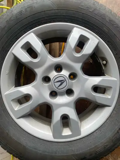 Set of 4 Rims + Tires Freshly balanced Size: 235/65R17 Falcon Tires really good condition good tread...