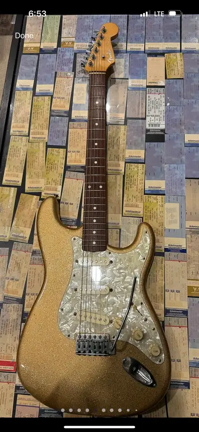 Made in Japan Fender Stratocaster. Comes with new fender hard shell case. 900$