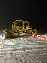 Custom land clearing, breaking, dug outs