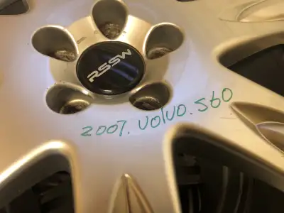 A set of Good Years snow tires 235/45R17 with aluminum rims. Off 2007 Volvo S60. Good tread conditio...