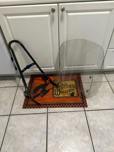 I am selling a used Harley Davidson backrest and windshield. This listing includes a sturdy backrest...