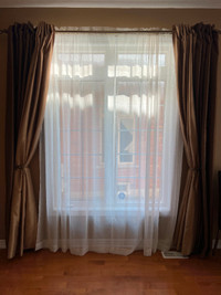 2 sets of curtains with rods