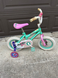 Girls 12” bike with training wheels. 