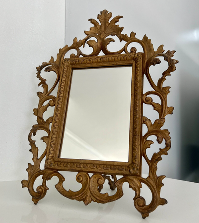 Mirror with an easel stand, Victorian Style Table Mirror. The heavy cast iron frame has an Antique B...
