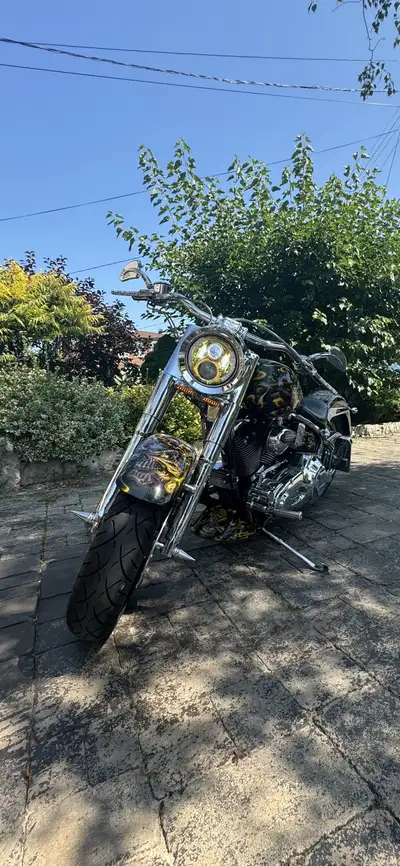 Feast your eyes on this custom Harley-Davidson Fat Boy, equipped with a Screamin' Eagle engine and a...