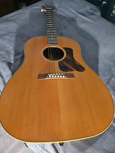 A 2013 GIBSON LIMITED EDITION ELECTRIC/ ACOUSTIC J-35 GUITAR., View more