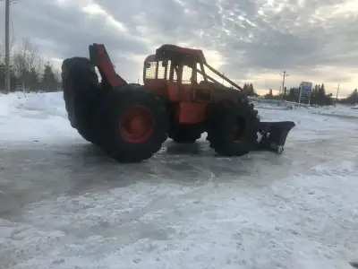 1984 Timberjack 240 gm motor 453, Snowplow included. Contact Georges directly at 705-262-5463