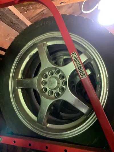 Tires and rims for a Lexus or Toyota size215/55/17. Comes with lug nut set