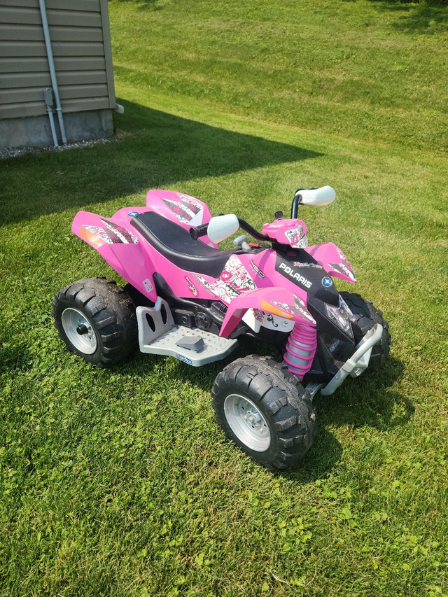Price drop! Polaris Outlaw 12V Kid ATV in Toys & Games in Oshawa / Durham Region