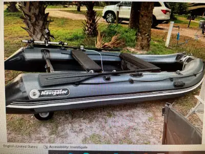 11.8 feet dinghy purchased new in 2021 for over 4000$ For sale including used trailer for 2600$ OBO....