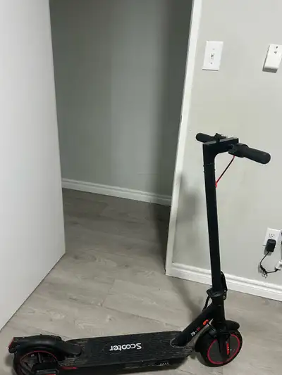Get around town effortlessly with this iScooter electric scooter, perfect for quick commutes and urb...