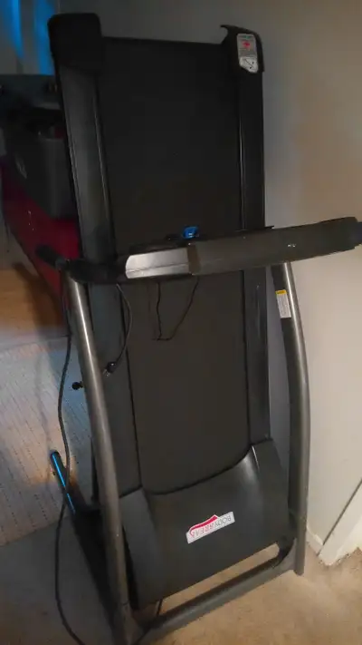 Old treadmill, loose front panel and cable but works well otherwise