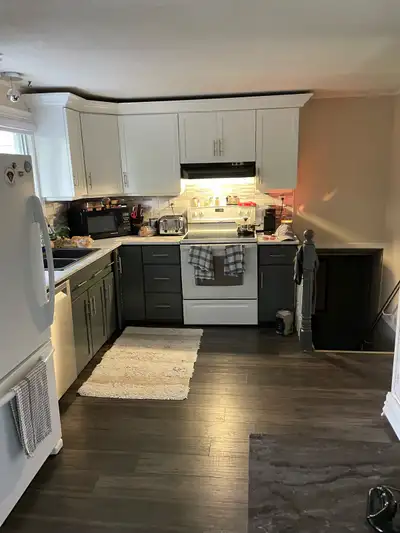 Large 18’ x 12’ bedroom for rent in partial basement. Rental includes use of kitchen, 2 shared washr...