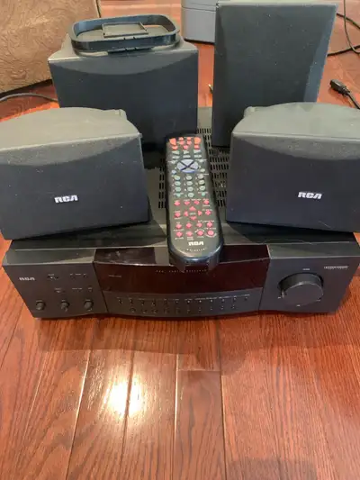 RCA Dolby surround sound 5 speaker system works good have the speaker and antenna wires as well.