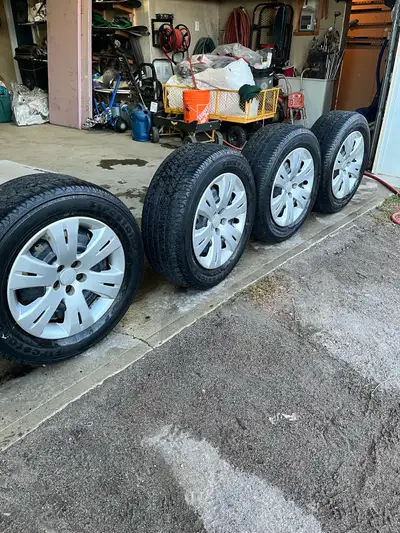 Good condition tires and rims from a Subaru. P225/60R16.