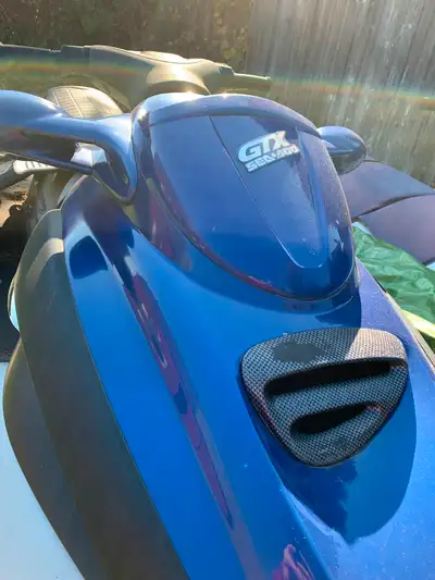 Blue GTX is a 2001 - very low hours - less than 30 Purple GTS is 1993 - more used still works great...