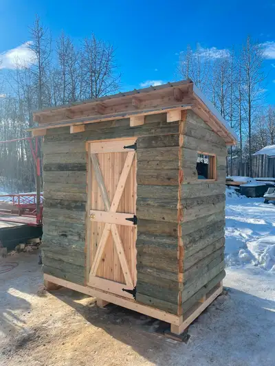 Made from rough cut cedar and pine 5 ft by 8 ft 8 ft high front 7 ft high at back Has locking door h...