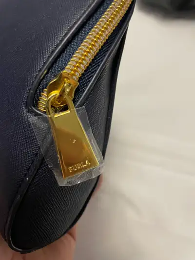 Toiletries or makeup bags by FURLA ITALY new and in excellent condition. Asking for $10. Pickup in t...