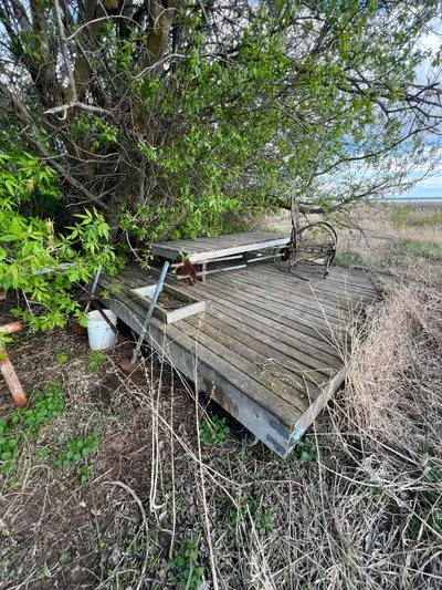 Floating dock 10’ by 10’ ish, made of 2x10 and 1x4 boards. Used as a floating island for the kids. M...