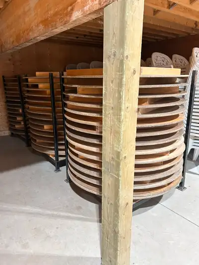 Commercial grade 5' round wood tables. Selling because we retired them from our event rental invento...