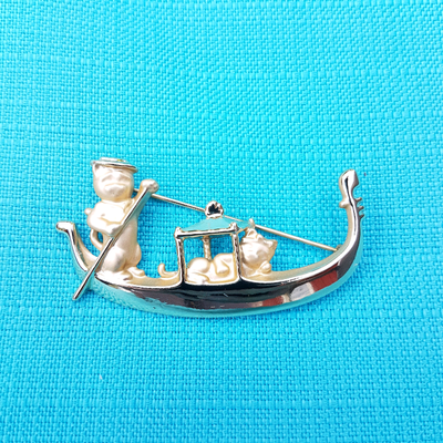Romatic Cats rowing in a boat Brooch. Price: $20.00 PICK UP IS IN WESTWOOD.